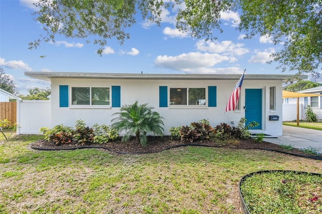 1529 Essex Dr N, Saint Petersburg, FL 33710 - view of front of property featuring stucco siding