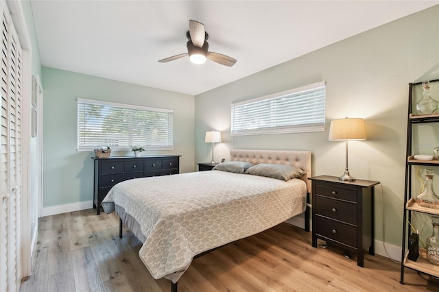 1529 Essex Dr N, Saint Petersburg, FL 33710 - bedroom featuring wood finished floors, baseboards, and a ceiling fan