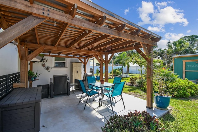 1529 Essex Dr N, Saint Petersburg, FL 33710 - view of patio / terrace featuring outdoor dining space and a pergola
