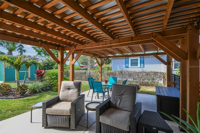 1529 Essex Dr N, Saint Petersburg, FL 33710 - view of patio with outdoor dining space and an outbuilding