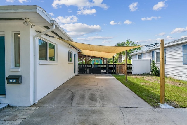 1529 Essex Dr N, Saint Petersburg, FL 33710 - view of patio featuring a carport