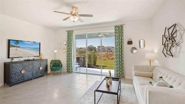 5112 Captain Davis Dr, Wimauma, FL 33598 - living area featuring a ceiling fan, tile patterned floors, and baseboards