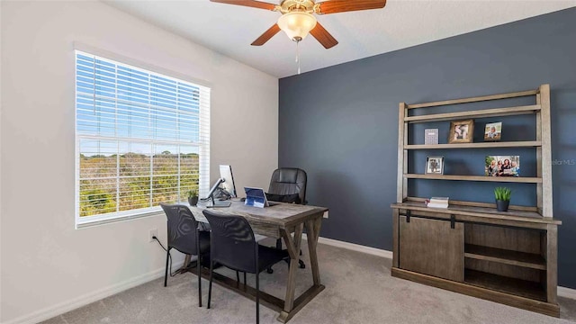 5112 Captain Davis Dr, Wimauma, FL 33598 - carpeted home office with ceiling fan and baseboards
