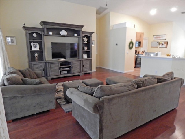 5815 Heronview Crescent Dr, Lithia, FL 33547 - living room featuring wood finished floors, baseboards, and recessed lighting