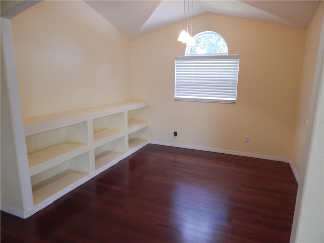 5815 Heronview Crescent Dr, Lithia, FL 33547 - unfurnished dining area featuring vaulted ceiling, wood finished floors, and baseboards