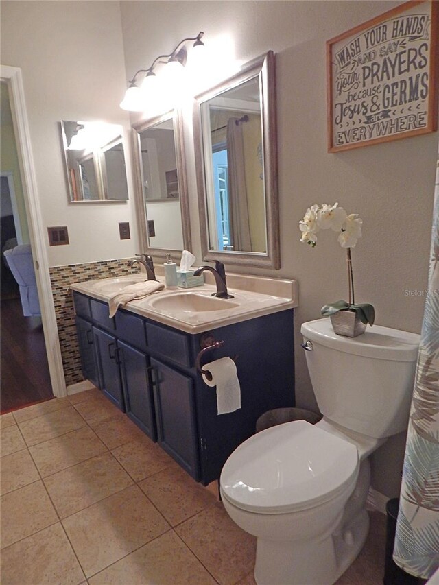5815 Heronview Crescent Dr, Lithia, FL 33547 - bathroom featuring tile patterned flooring, double vanity, and toilet