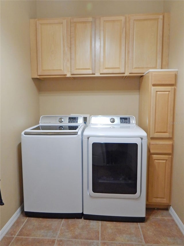 5815 Heronview Crescent Dr, Lithia, FL 33547 - laundry room featuring washer and dryer, cabinet space, and baseboards