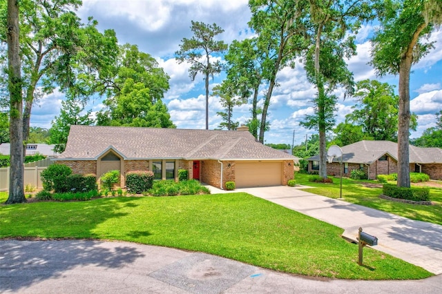 2921 SE 38th Pl, Ocala, FL 34480 - single story home featuring a garage, brick siding, concrete driveway, a chimney, and a shingled roof