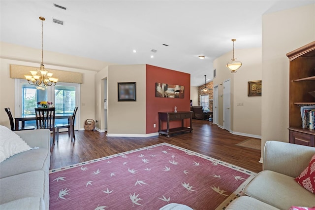 2921 SE 38th Pl, Ocala, FL 34480 - living area featuring a chandelier, wood finished floors, and lofted ceiling