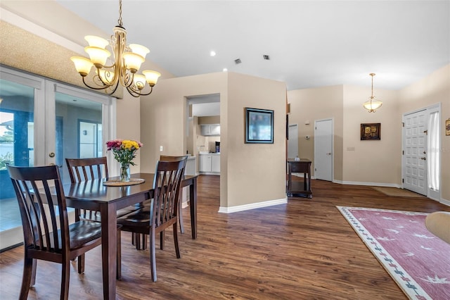 2921 SE 38th Pl, Ocala, FL 34480 - dining area with dark wood-style flooring, a chandelier, and recessed lighting