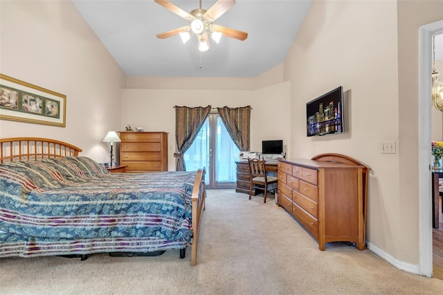2921 SE 38th Pl, Ocala, FL 34480 - bedroom featuring light carpet, lofted ceiling, a ceiling fan, and a desk