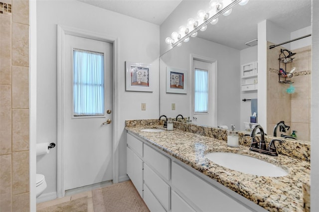 2921 SE 38th Pl, Ocala, FL 34480 - bathroom with double vanity and tiled shower