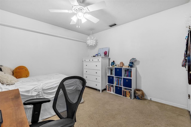2921 SE 38th Pl, Ocala, FL 34480 - bedroom with light carpet and a ceiling fan