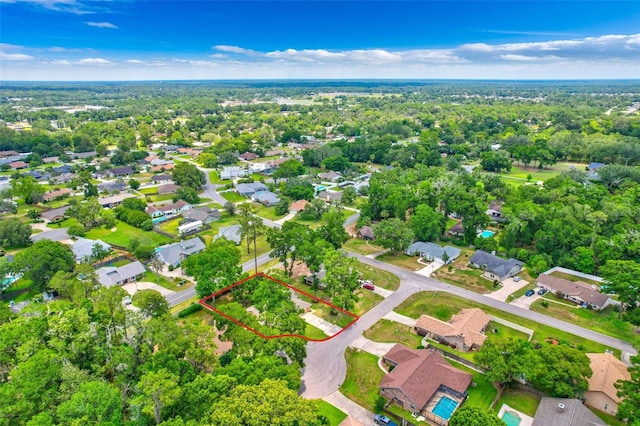 2921 SE 38th Pl, Ocala, FL 34480 - aerial perspective of suburban area featuring property boundaries highlighted