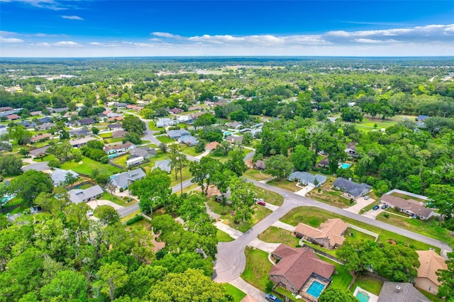 2921 SE 38th Pl, Ocala, FL 34480 - aerial view of property and surrounding area with nearby suburban area