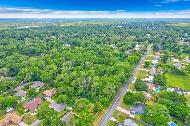2921 SE 38th Pl, Ocala, FL 34480 - aerial view of property and surrounding area with nearby suburban area