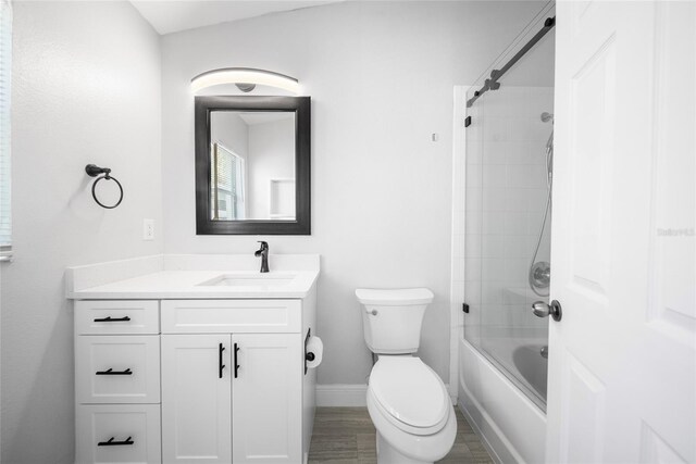 11363 Cocoa Beach Dr, Riverview, FL 33569 - full bath featuring vanity, toilet, baseboards, and shower / bath combination