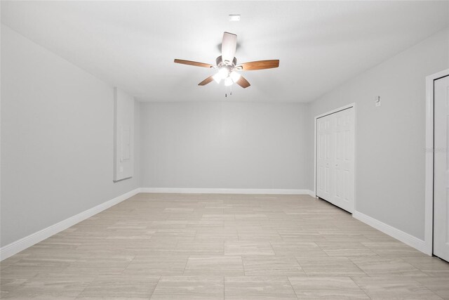 11363 Cocoa Beach Dr, Riverview, FL 33569 - empty room featuring a ceiling fan and baseboards