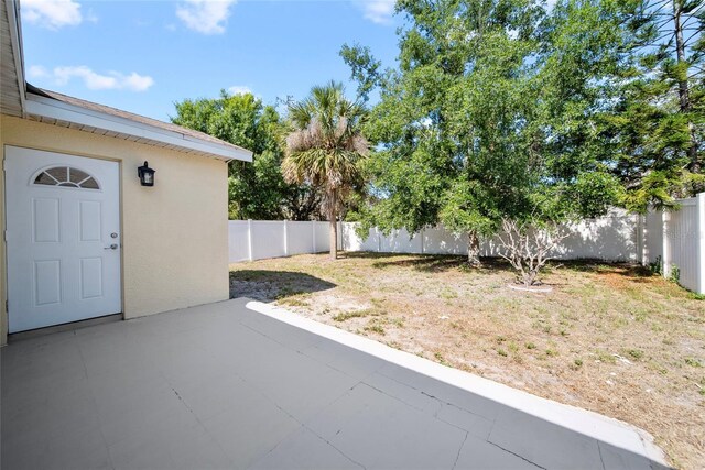 11363 Cocoa Beach Dr, Riverview, FL 33569 - fenced backyard featuring a patio area