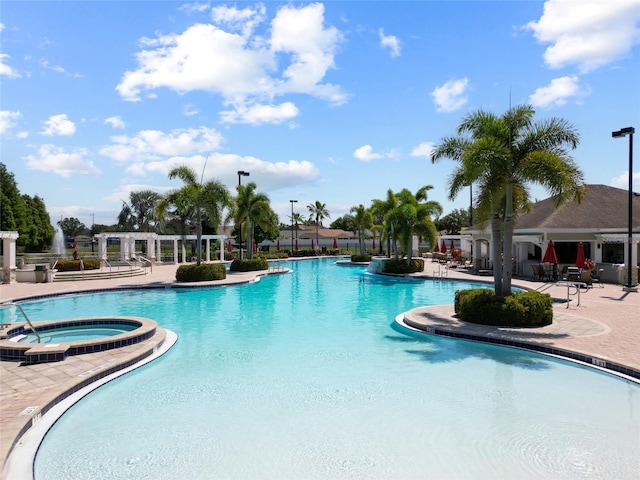 11363 Cocoa Beach Dr, Riverview, FL 33569 - community pool with a hot tub and a patio area
