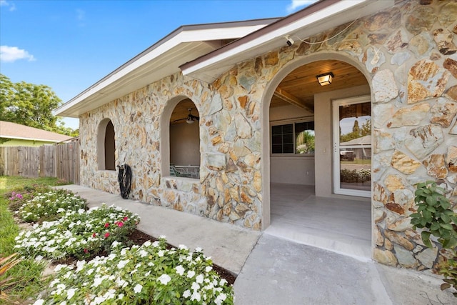 8918 Carmen Ln, Port Richey, FL 34668 - doorway to property with stone siding