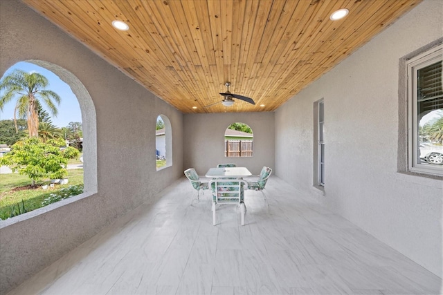 8918 Carmen Ln, Port Richey, FL 34668 - view of patio / terrace featuring outdoor dining area and ceiling fan