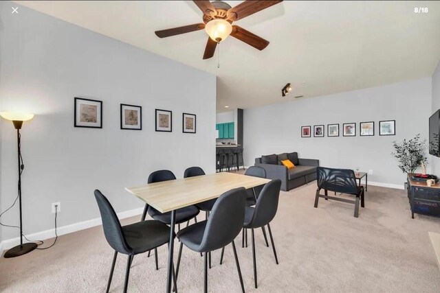 3175 Feltrim Pl Unit 405, Kissimmee, FL 34747 - dining area featuring light colored carpet and a ceiling fan