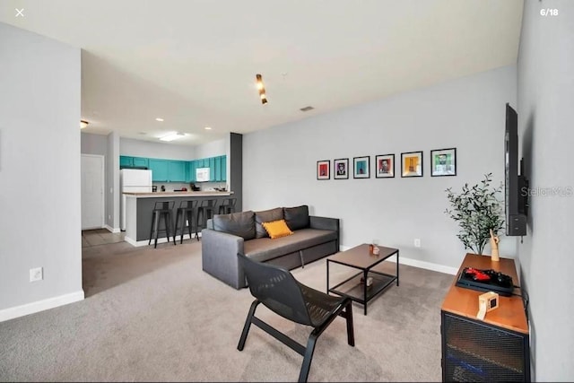 3175 Feltrim Pl Unit 405, Kissimmee, FL 34747 - living area with light carpet and recessed lighting