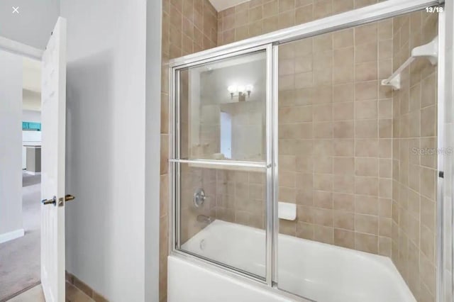 3175 Feltrim Pl Unit 405, Kissimmee, FL 34747 - bathroom featuring shower / bath combination with glass door