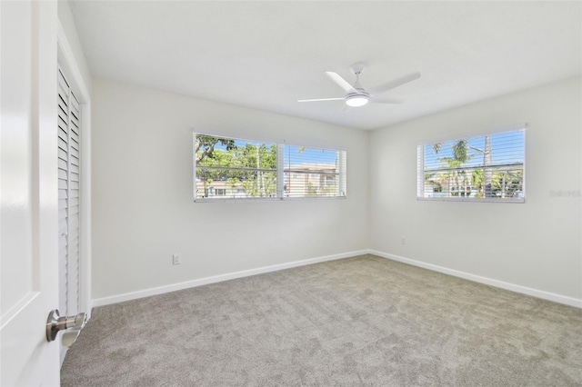 94 Nicholas Dr, Dunedin, FL 34698 - unfurnished bedroom with carpet and baseboards