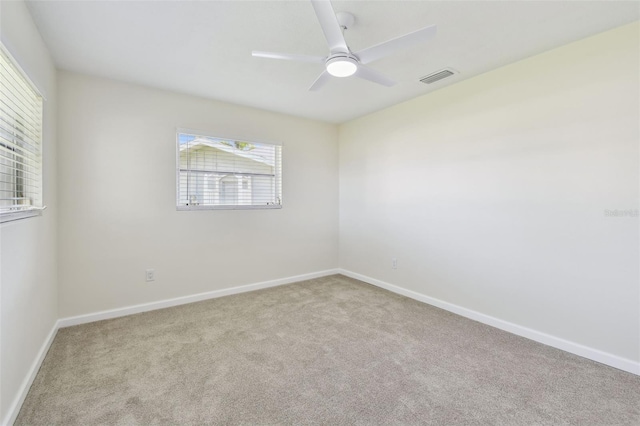 94 Nicholas Dr, Dunedin, FL 34698 - unfurnished room featuring carpet, a ceiling fan, and baseboards