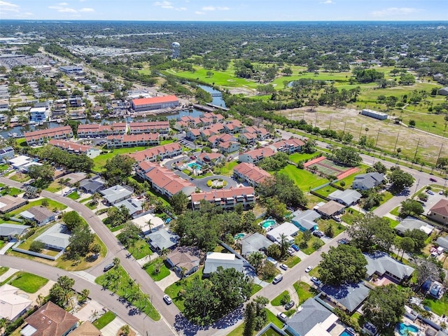 94 Nicholas Dr, Dunedin, FL 34698 - aerial view of property's location with a nearby body of water and nearby suburban area