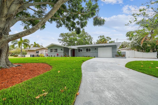 94 Nicholas Dr, Dunedin, FL 34698 - ranch-style home featuring an attached garage and driveway
