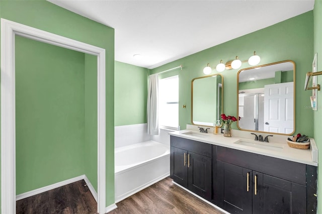 1204 Rinkfield Pl, Brandon, FL 33511 - full bath featuring wood finished floors, a garden tub, double vanity, and a stall shower