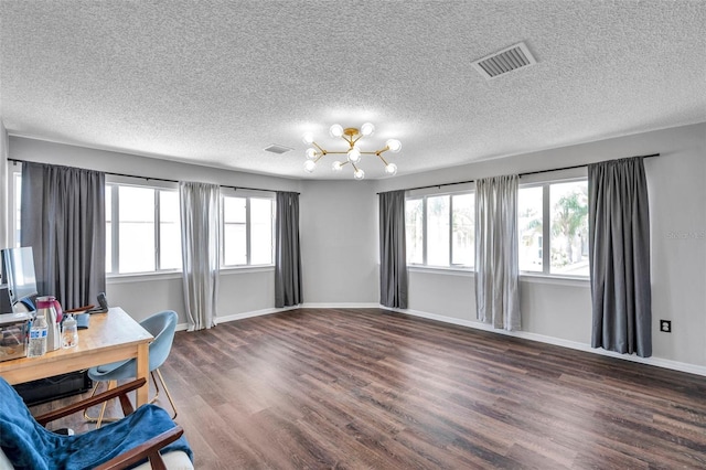 1204 Rinkfield Pl, Brandon, FL 33511 - home office with plenty of natural light, wood finished floors, a textured ceiling, and a chandelier