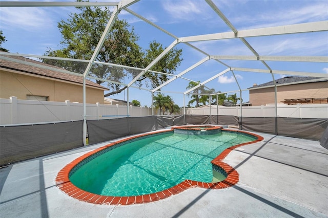 1204 Rinkfield Pl, Brandon, FL 33511 - view of swimming pool featuring a patio, a fenced backyard, a lanai, and a pool with connected hot tub