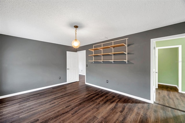 1204 Rinkfield Pl, Brandon, FL 33511 - empty room featuring wood finished floors and a textured ceiling