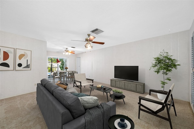 1211 Stony Brook Ln, Dunedin, FL 34698 - living area featuring carpet floors and ceiling fan