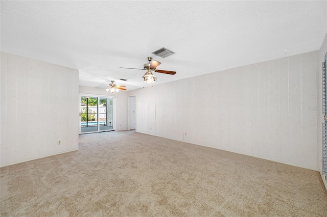1211 Stony Brook Ln, Dunedin, FL 34698 - carpeted spare room featuring a ceiling fan