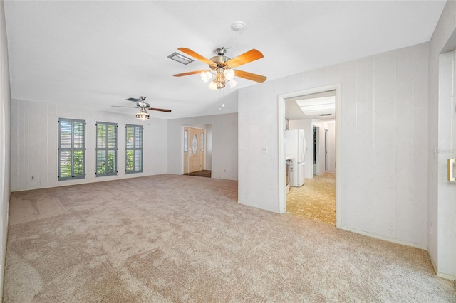 1211 Stony Brook Ln, Dunedin, FL 34698 - unfurnished living room featuring light carpet and ceiling fan