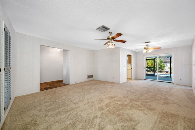 1211 Stony Brook Ln, Dunedin, FL 34698 - carpeted spare room featuring a ceiling fan