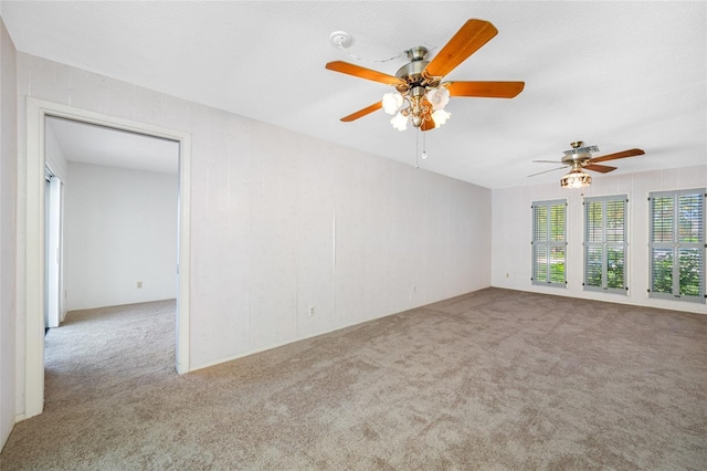 1211 Stony Brook Ln, Dunedin, FL 34698 - carpeted spare room featuring a ceiling fan