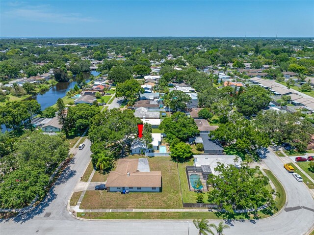 1211 Stony Brook Ln, Dunedin, FL 34698 - aerial perspective of suburban area with a nearby body of water