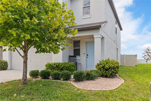 6180 Spring Crayfish Ave, New Port Richey, FL 34653 - view of front facade featuring stucco siding, a front lawn, and concrete driveway