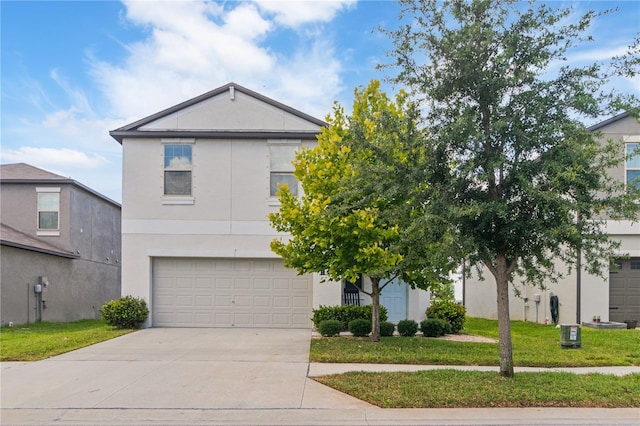 6180 Spring Crayfish Ave, New Port Richey, FL 34653 - view of front of house with concrete driveway, stucco siding, and a garage