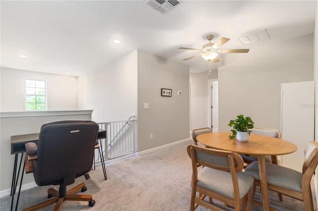 6180 Spring Crayfish Ave, New Port Richey, FL 34653 - dining space with light carpet, a ceiling fan, baseboards, recessed lighting, and a desk