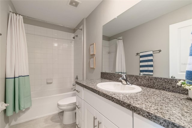 6180 Spring Crayfish Ave, New Port Richey, FL 34653 - bathroom featuring vanity, shower / tub combo, toilet, and tile patterned flooring
