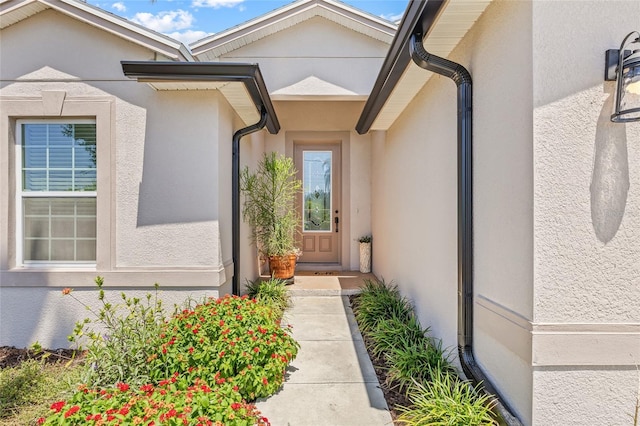 6741 51st Way N, Pinellas Park, FL 33781 - entrance to property featuring stucco siding