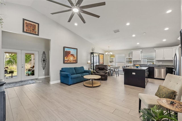 6741 51st Way N, Pinellas Park, FL 33781 - living area featuring a ceiling fan, recessed lighting, plenty of natural light, a chandelier, and baseboards