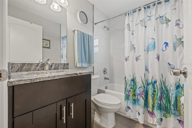 6741 51st Way N, Pinellas Park, FL 33781 - bathroom featuring vanity, toilet, shower / bath combo, and wood finished floors